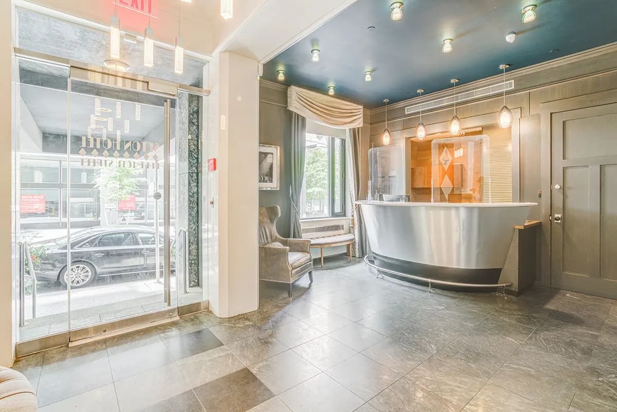 The ground-floor lobby at Seton Residence, looking out through the street windows